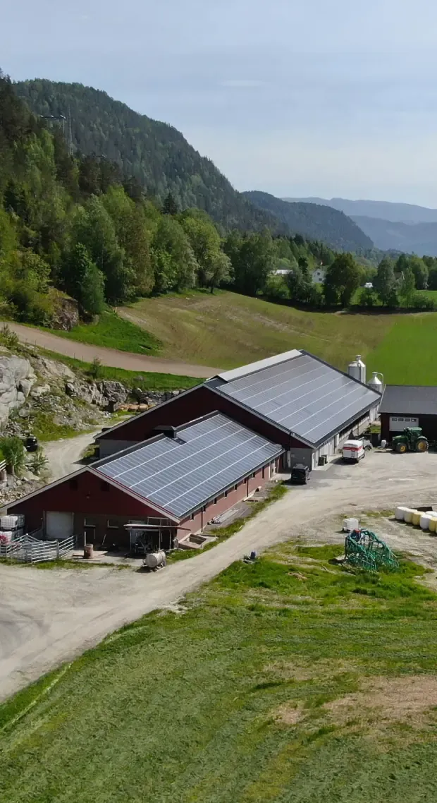Barn with solar panels mounted across the whole roof.